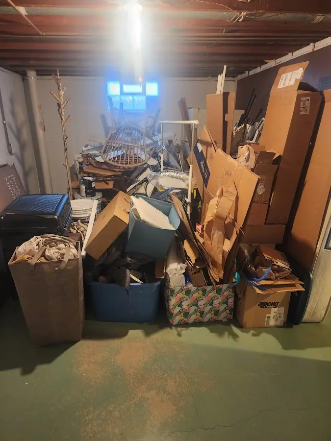 Roll-off dumpster container at job site for 8 Yard Dumpster Rental in Wade Hampton